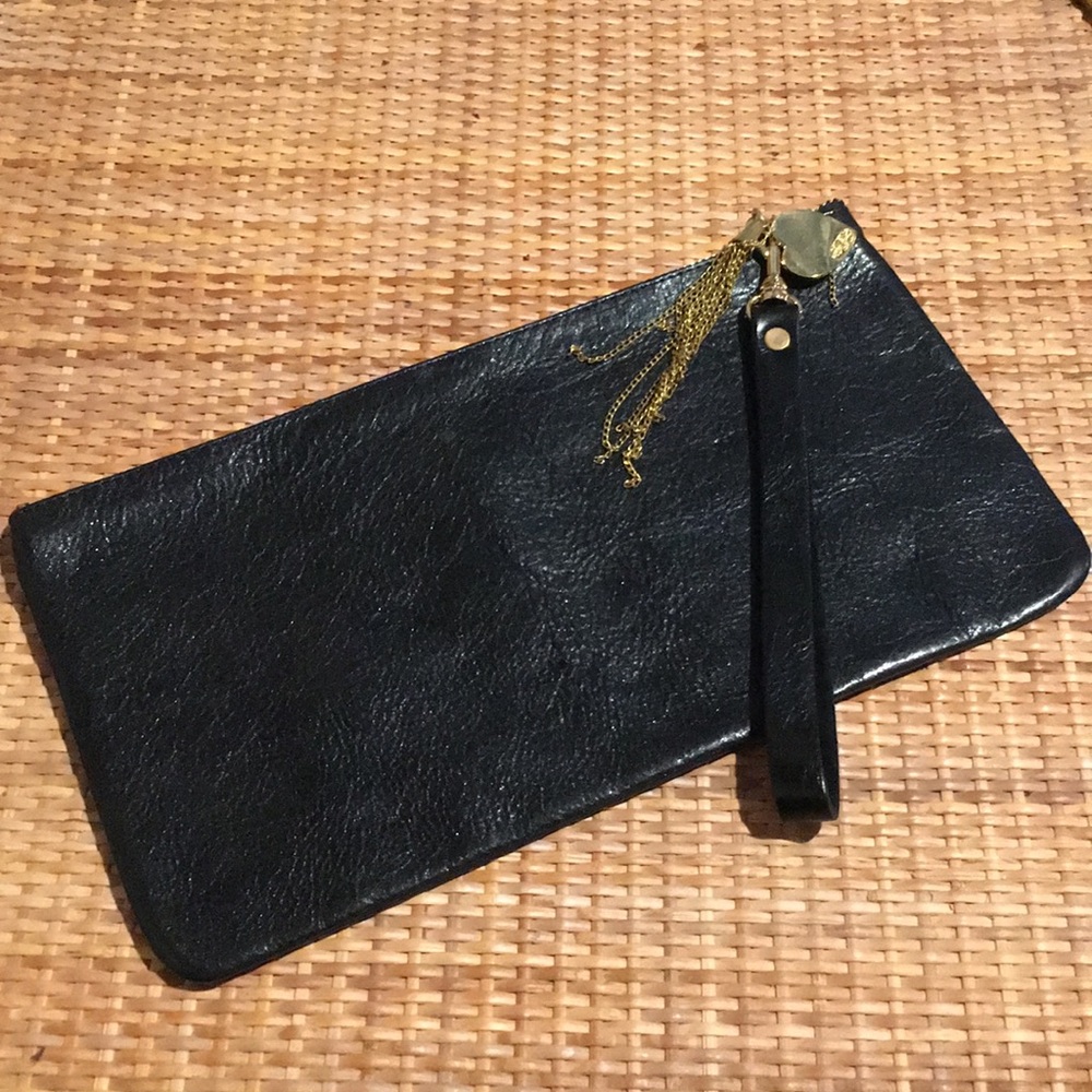 Black Moss Mills clutch with heart charm.